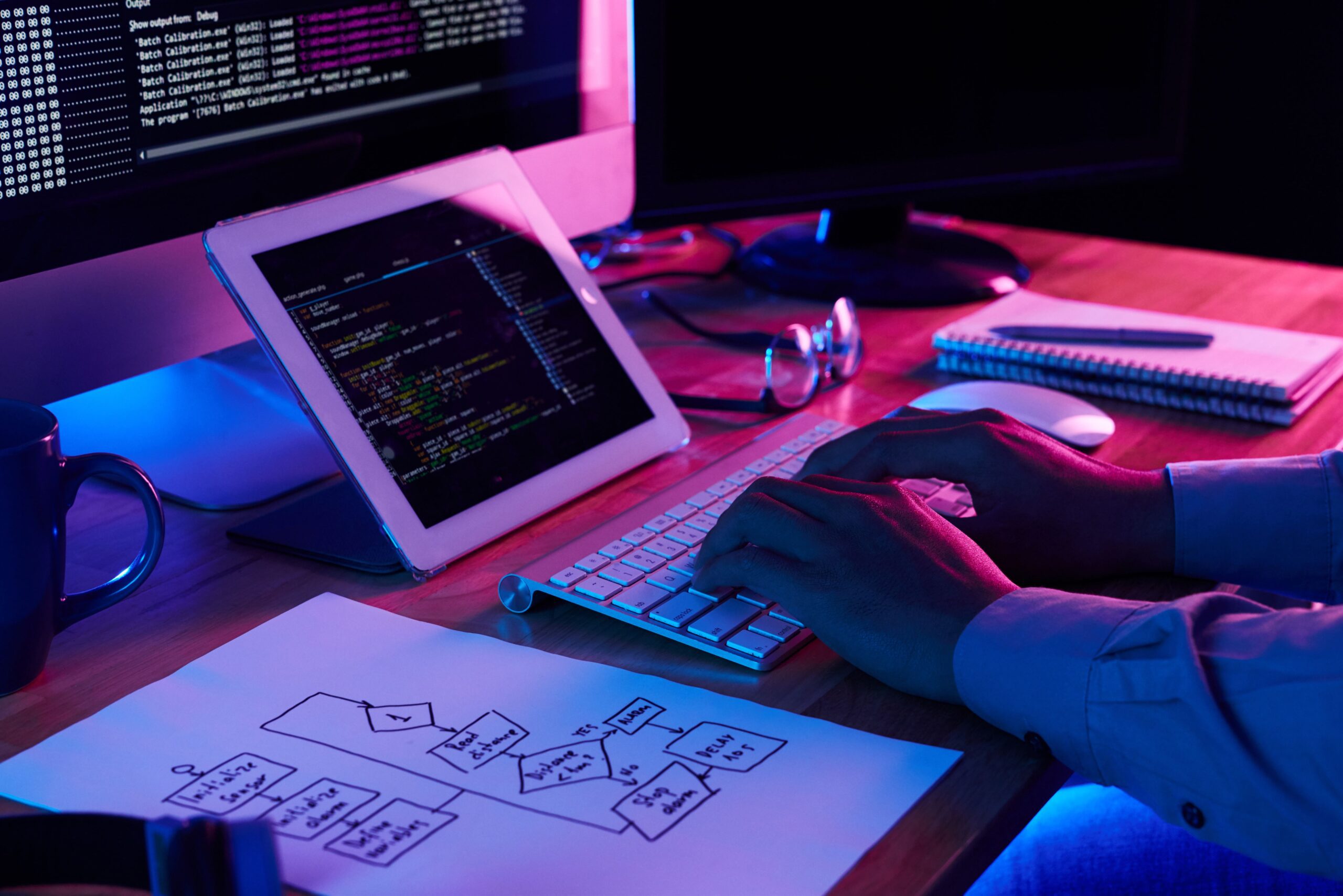 close up image programer working his desk office scaled